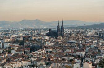 Aerial view of Clermont-Ferrand city at sunset from Parc de Monjuzet.